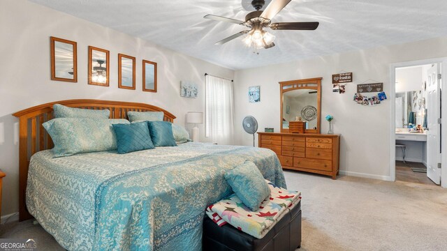 2675 Springside Ct, Douglasville, GA 30135 - bedroom with carpet, baseboards, a ceiling fan, and ensuite bath