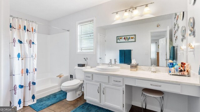 2675 Springside Ct, Douglasville, GA 30135 - full bathroom featuring tile patterned floors, toilet, shower / bath combination with curtain, and vanity