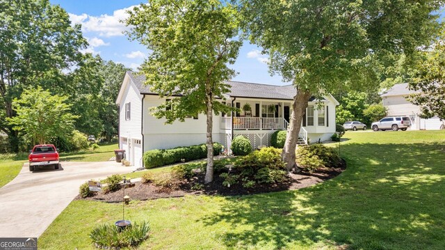2675 Springside Ct, Douglasville, GA 30135 - ranch-style home featuring a porch, concrete driveway, a front lawn, a garage, and a shingled roof