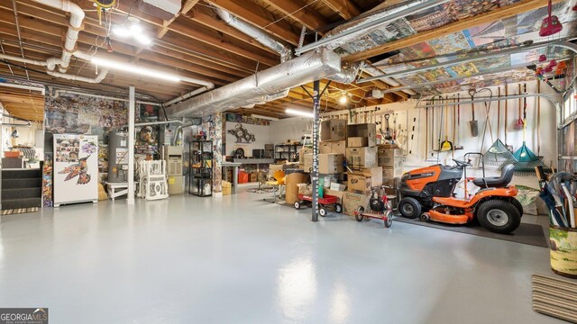 2675 Springside Ct, Douglasville, GA 30135 - garage with freestanding refrigerator and water heater