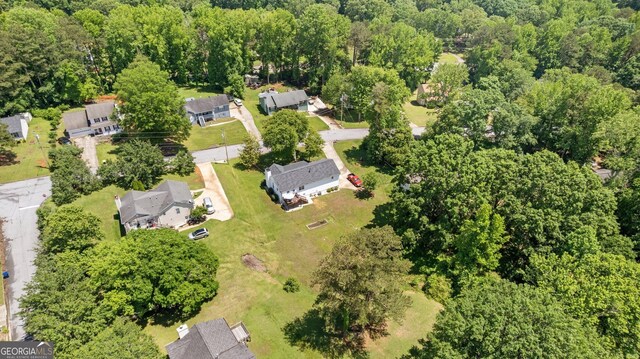 2675 Springside Ct, Douglasville, GA 30135 - aerial view of property's location with nearby suburban area and a heavily wooded area