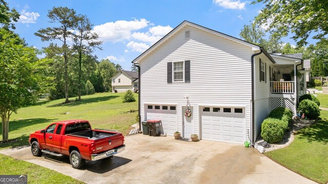 2675 Springside Ct, Douglasville, GA 30135 - view of home's exterior with an attached garage, driveway, and a lawn
