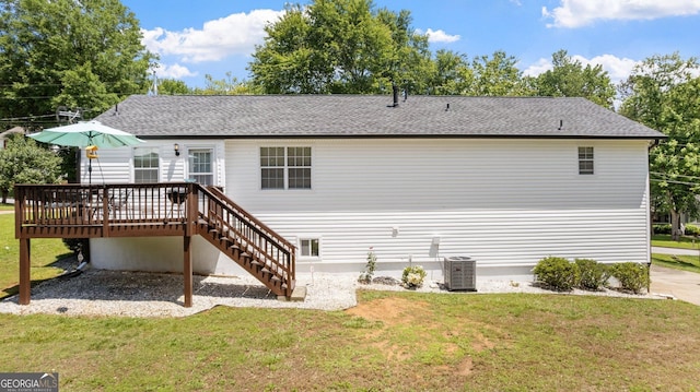 2675 Springside Ct, Douglasville, GA 30135 - rear view of house featuring a deck, cooling unit, a yard, stairs, and a shingled roof