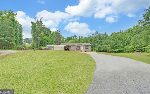 484 Tb Thornton Dr, Hartwell, GA 30643 - view of front of property with asphalt driveway, a front lawn, and a view of trees