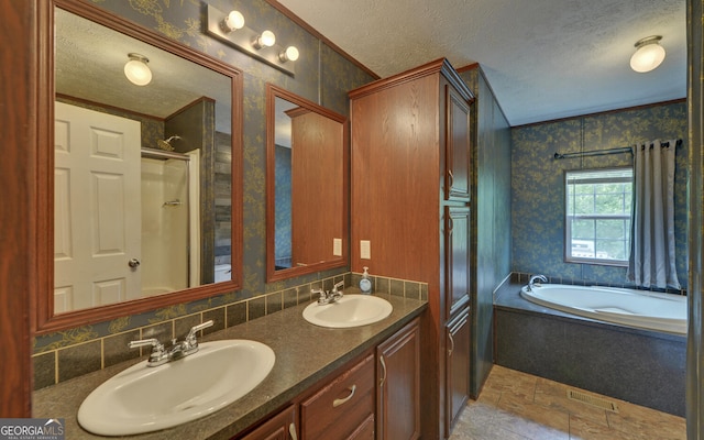 484 Tb Thornton Dr, Hartwell, GA 30643 - full bathroom featuring a textured ceiling, wallpapered walls, a bath, a shower, and double vanity
