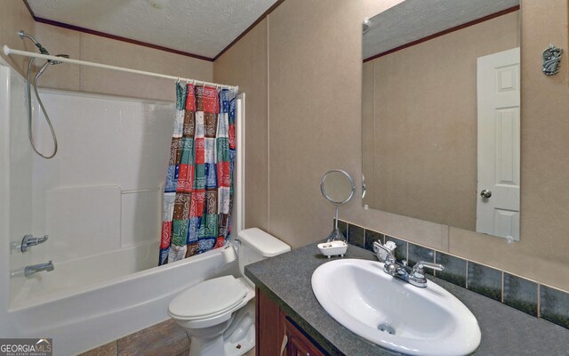 484 Tb Thornton Dr, Hartwell, GA 30643 - bathroom featuring a textured ceiling, ornamental molding, shower / bath combination with curtain, toilet, and vanity