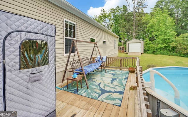 484 Tb Thornton Dr, Hartwell, GA 30643 - deck with a yard, an outdoor structure, an outdoor pool, and view of scattered trees