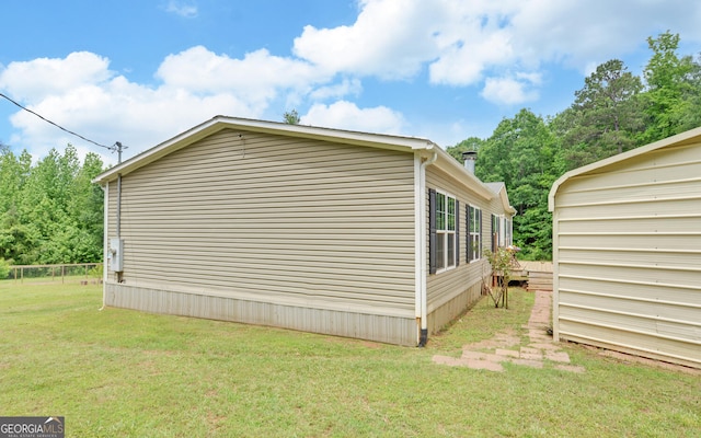 484 Tb Thornton Dr, Hartwell, GA 30643 - view of side of property with a lawn