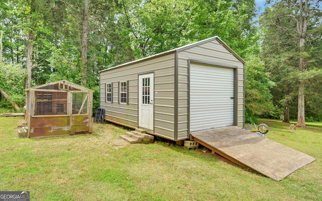 484 Tb Thornton Dr, Hartwell, GA 30643 - view of outdoor structure featuring an outdoor structure, entry steps, and view of wooded area