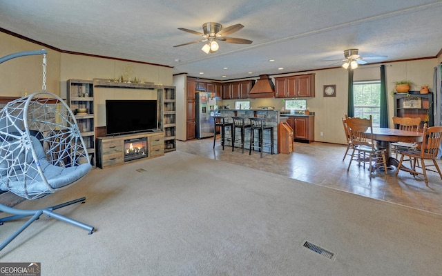 484 Tb Thornton Dr, Hartwell, GA 30643 - living area featuring ceiling fan, ornamental molding, and recessed lighting