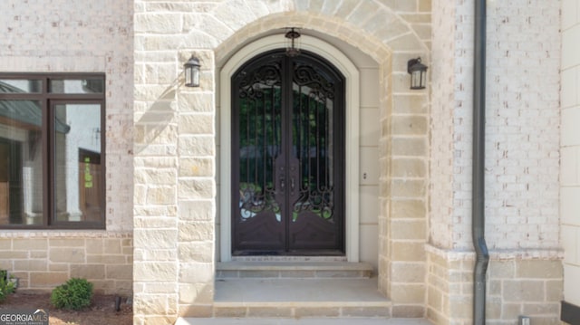 10765 Shallowford Rd, Roswell, GA 30075 - doorway to property featuring brick siding