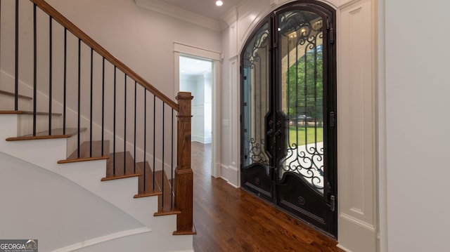 10765 Shallowford Rd, Roswell, GA 30075 - foyer entrance featuring wood finished floors, ornamental molding, stairway, recessed lighting, and arched walkways