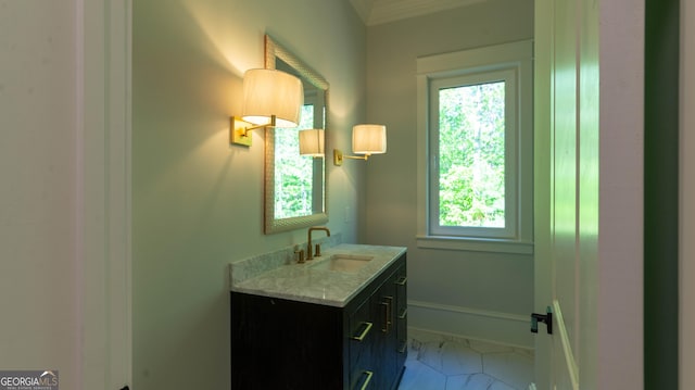 10765 Shallowford Rd, Roswell, GA 30075 - bathroom featuring vanity, healthy amount of natural light, and ornamental molding