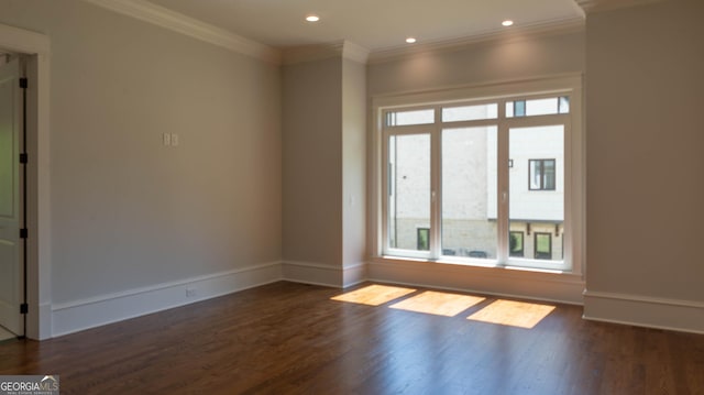 10765 Shallowford Rd, Roswell, GA 30075 - spare room with dark wood-type flooring, ornamental molding, and recessed lighting