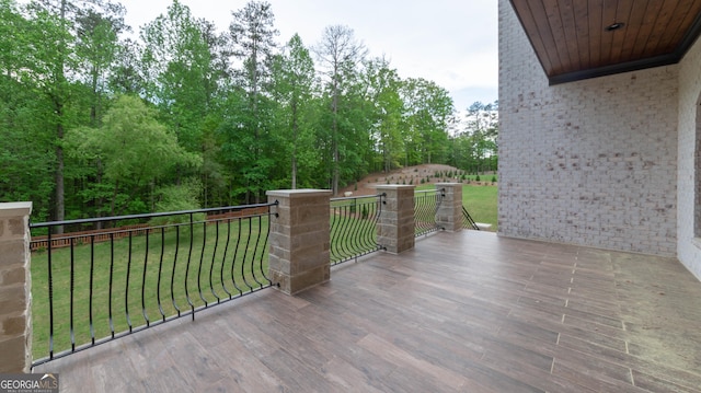 10765 Shallowford Rd, Roswell, GA 30075 - wooden deck featuring a lawn