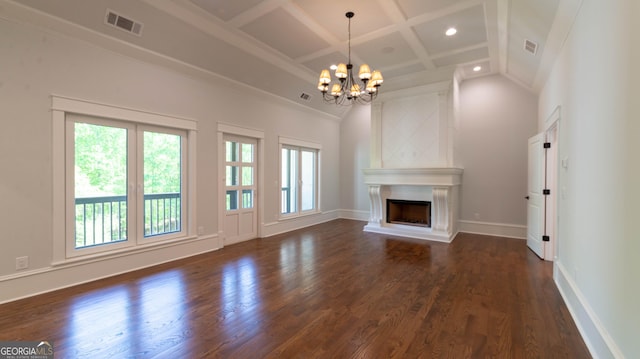 10765 Shallowford Rd, Roswell, GA 30075 - unfurnished living room featuring a chandelier, dark wood-type flooring, a fireplace with raised hearth, coffered ceiling, and recessed lighting