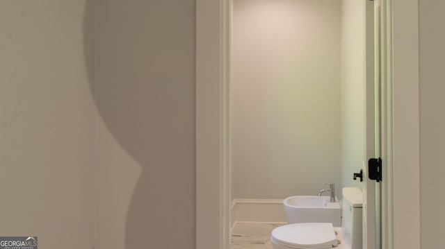 10765 Shallowford Rd, Roswell, GA 30075 - bathroom featuring marble finish floors and a bidet