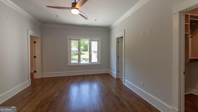 10765 Shallowford Rd, Roswell, GA 30075 - unfurnished bedroom with dark wood-type flooring, ornamental molding, and a ceiling fan