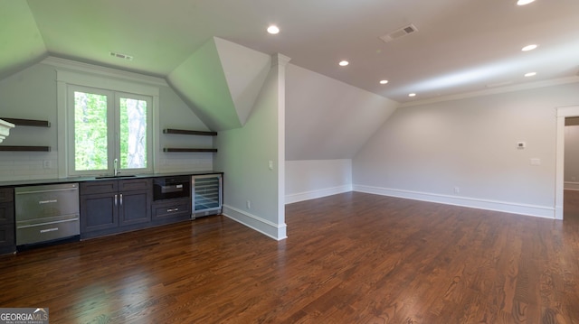10765 Shallowford Rd, Roswell, GA 30075 - bar featuring stainless steel dishwasher, beverage cooler, lofted ceiling, recessed lighting, and dark wood-style flooring