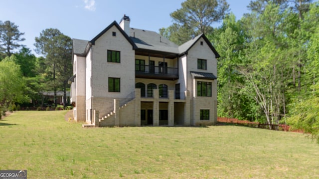 10765 Shallowford Rd, Roswell, GA 30075 - back of property featuring a balcony, a yard, stairway, and a chimney