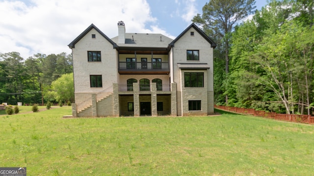 10765 Shallowford Rd, Roswell, GA 30075 - rear view of house with a balcony, stairs, and a chimney