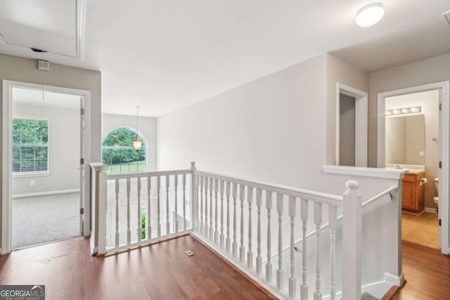 2896 Chilhowee Dr, Atlanta, GA 30331 - corridor featuring attic access, an upstairs landing, wood finished floors, and baseboards
