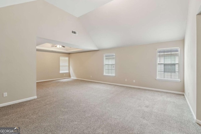 2896 Chilhowee Dr, Atlanta, GA 30331 - carpeted empty room featuring a ceiling fan, vaulted ceiling, and baseboards