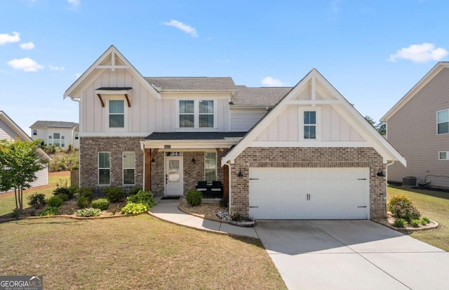 4607 Underwood Walk, Powder Springs, GA 30127 - view of front of property featuring board and batten siding, brick siding, and a front yard