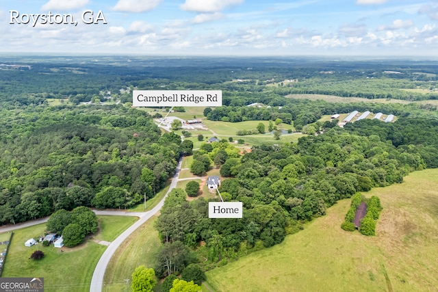 drone / aerial view of a heavily wooded area