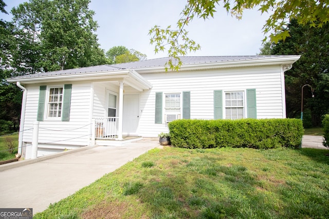 3530 Refuge Rd, Jasper, GA 30143 - view of front of home with a front lawn and metal roof