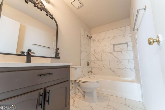 full bath with marble look tiles, vanity, toilet, and shower / bathtub combination