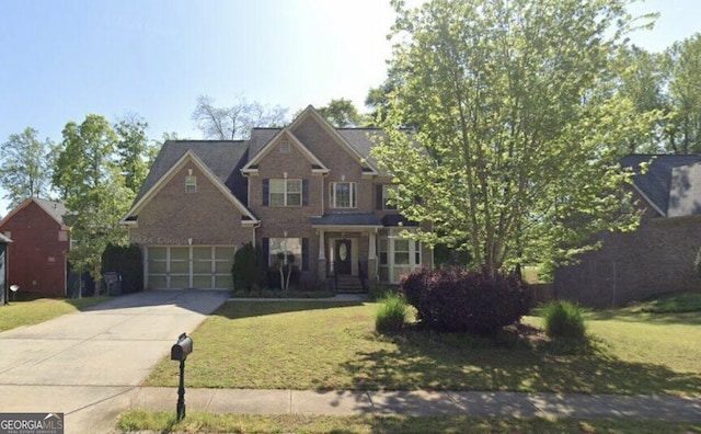 145 Windward Hls, Mcdonough, GA 30253 - traditional-style home featuring concrete driveway, a front yard, and an attached garage