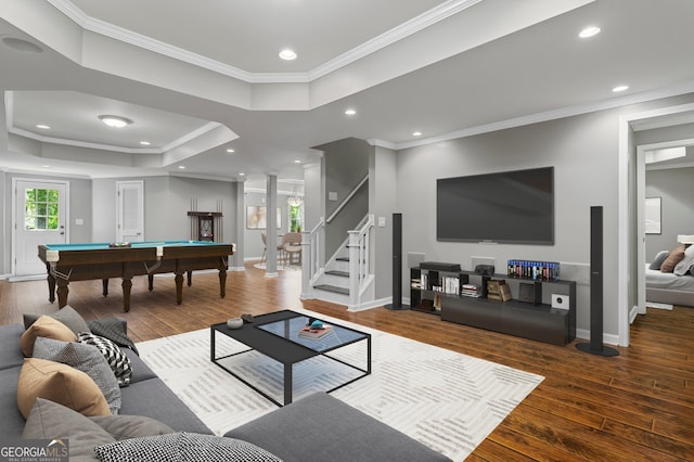 235 Foxley Way, Roswell, GA 30075 - living room featuring pool table, wood finished floors, ornate columns, a raised ceiling, and ornamental molding