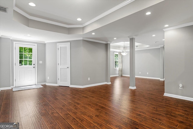235 Foxley Way, Roswell, GA 30075 - unfurnished living room featuring ornate columns, dark wood-type flooring, ornamental molding, baseboards, and recessed lighting