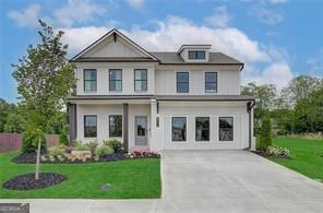 2700 Westgate Park Dr Unit 1A, Loganville, GA 30052 - view of front facade with driveway and a front yard