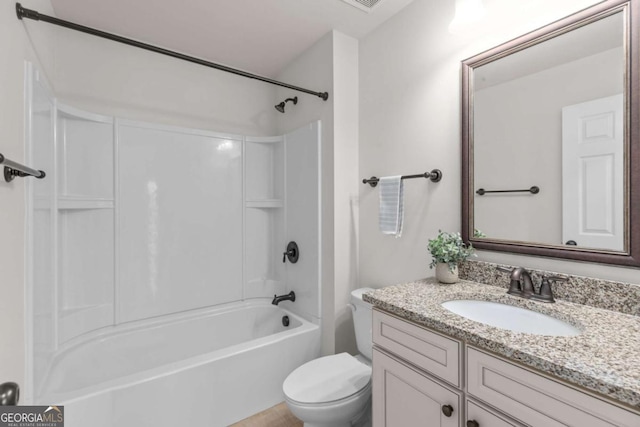 bathroom featuring toilet, vanity, and washtub / shower combination