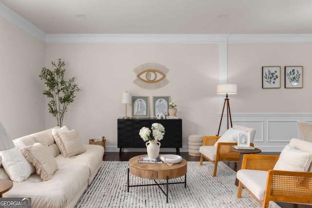 living room featuring crown molding and wood finished floors