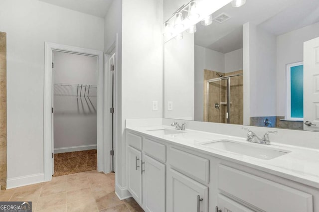 34 Cooper Dr Unit 53, Mansfield, GA 30055 - full bath with a stall shower, double vanity, and a walk in closet