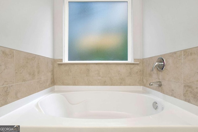 34 Cooper Dr Unit 53, Mansfield, GA 30055 - full bathroom with healthy amount of natural light and a garden tub