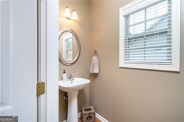 59 Creekside Blf, Hiram, GA 30141 - bathroom with baseboards and a sink