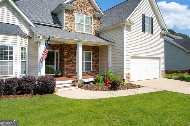 59 Creekside Blf, Hiram, GA 30141 - craftsman-style house featuring stone siding, covered porch, roof with shingles, and driveway