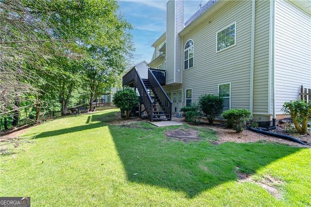 59 Creekside Blf, Hiram, GA 30141 - view of yard featuring stairs and a deck