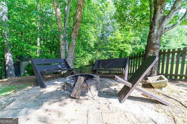 59 Creekside Blf, Hiram, GA 30141 - view of patio with an outdoor fire pit