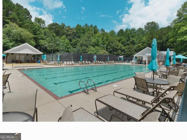 59 Creekside Blf, Hiram, GA 30141 - community pool with a patio area