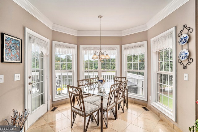 127 Courts Of Hampton, Hampton, GA 30228 - dining room with ornamental molding, light tile patterned floors, healthy amount of natural light, and a chandelier