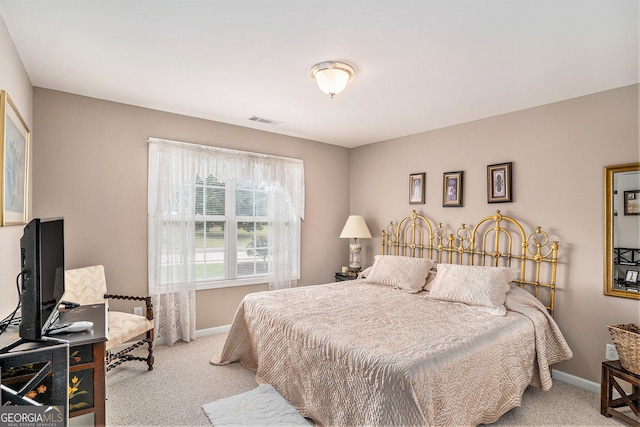 127 Courts Of Hampton, Hampton, GA 30228 - bedroom with light carpet and baseboards