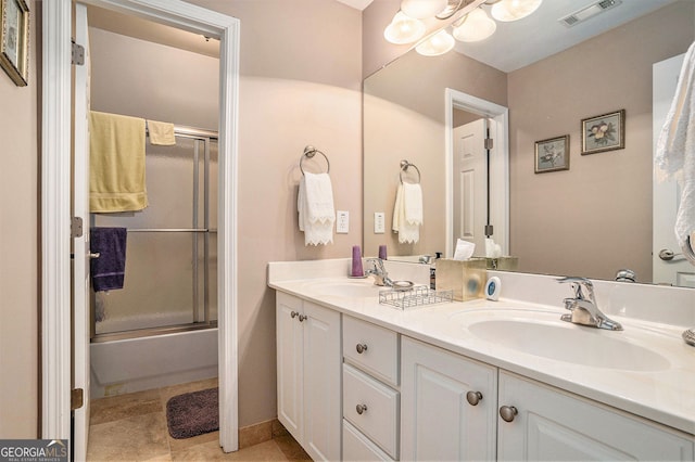 127 Courts Of Hampton, Hampton, GA 30228 - full bathroom with double vanity and combined bath / shower with glass door