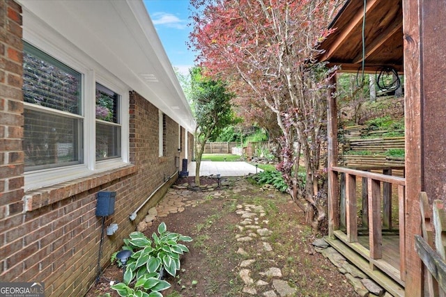 fenced backyard with a patio