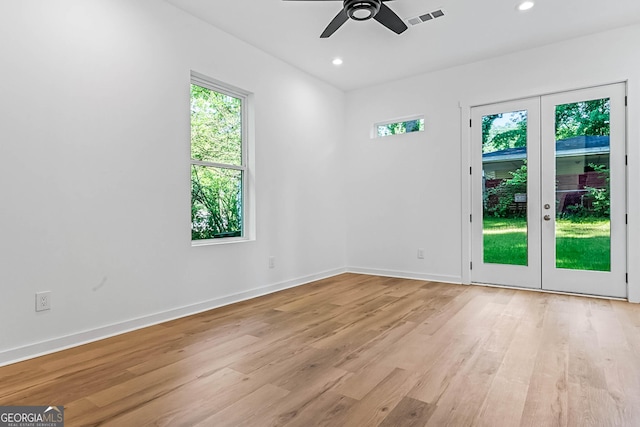 1835 Taylor Ave, East Point, GA 30344 - spare room featuring light wood finished floors, a ceiling fan, french doors, baseboards, and recessed lighting