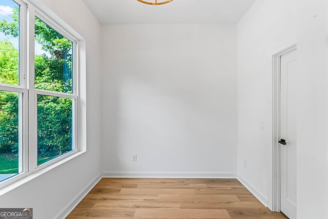 1835 Taylor Ave, East Point, GA 30344 - spare room with healthy amount of natural light, light wood-style floors, and baseboards
